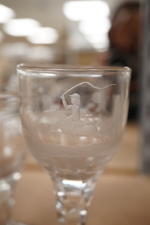 Four Georgian wine glasses, three with engraved bowls, three with faceted stems, and one with an air twist knopped stem and stepped foot, tallest 16cm